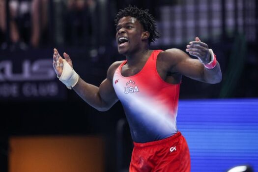 Frederick Richard celebrates his floor routine during the men's U.S. Olympic Team Trials at Target Center.